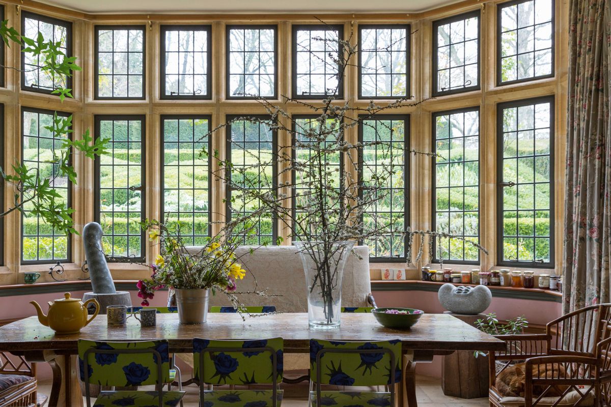 Combining Stone and Wood in the Restoration of House Windows and Doors